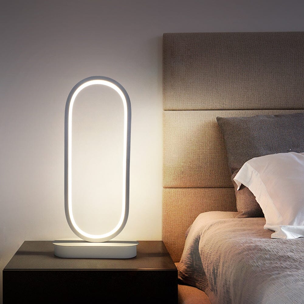 Luminova kompaktní oválná lampa s železným povrchem pro moderní pokoje