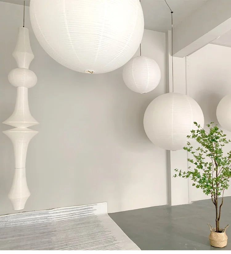 Luma-valaisimet, joissa on veistoksellinen muoto ja japanilainen geometrinen minimalismi