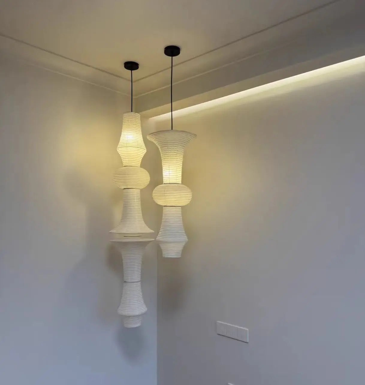Luma-valaisimet, joissa on veistoksellinen muoto ja japanilainen geometrinen minimalismi