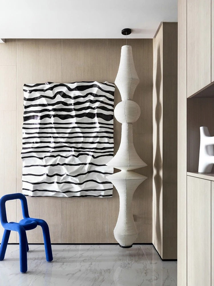 Luma-valaisimet, joissa on veistoksellinen muoto ja japanilainen geometrinen minimalismi