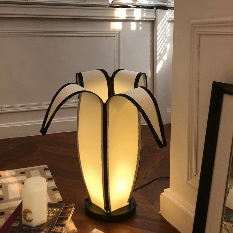 Lampa stołowa LumiBan w kształcie banana z miękkim, ciepłym światłem