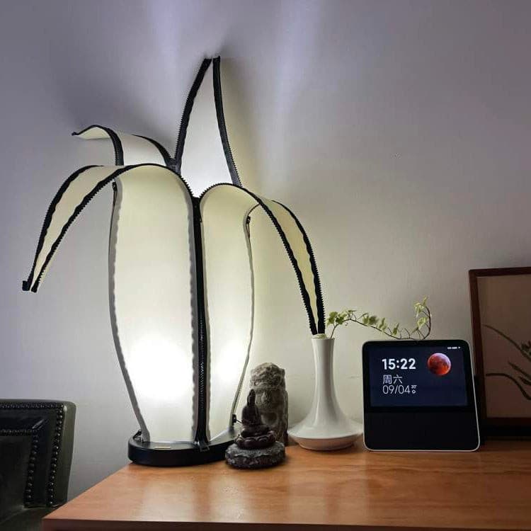 Lampa stołowa LumiBan w kształcie banana z miękkim, ciepłym światłem