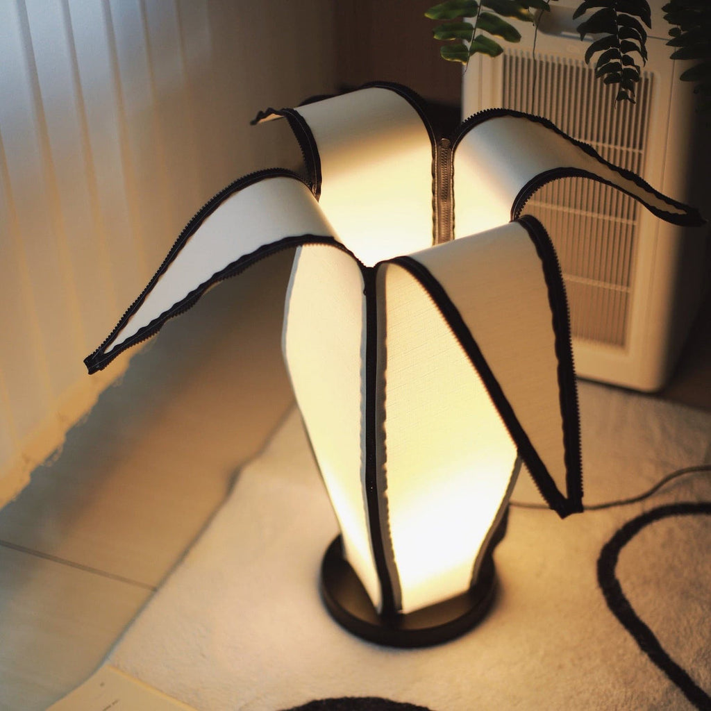 Lampa stołowa LumiBan w kształcie banana z miękkim, ciepłym światłem