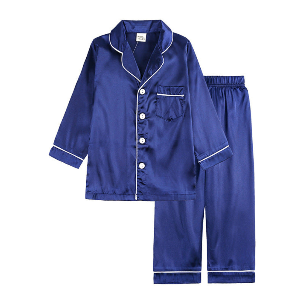 Conjunto de pijama para niños con botones en la parte superior y pantalones a juego