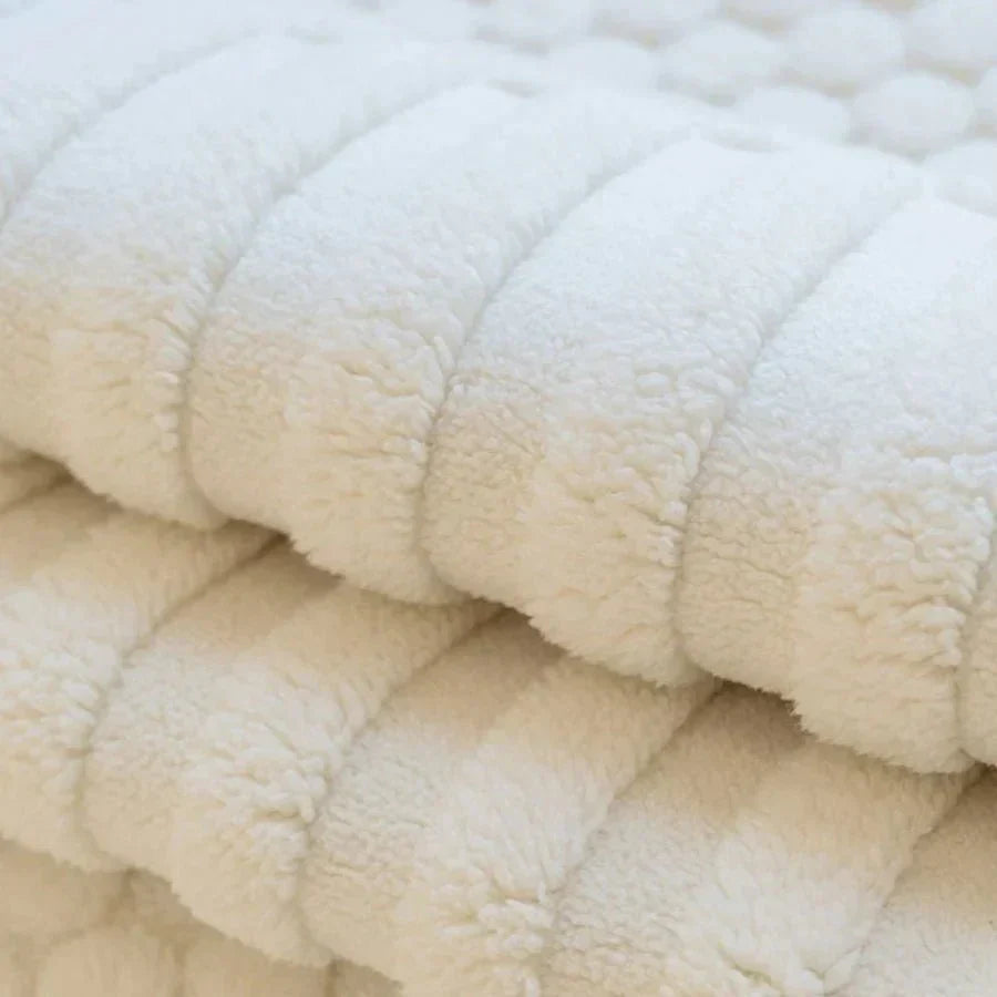 Funda de sofá de forro polar grueso Cozy Cloud con mechones para calidez en invierno