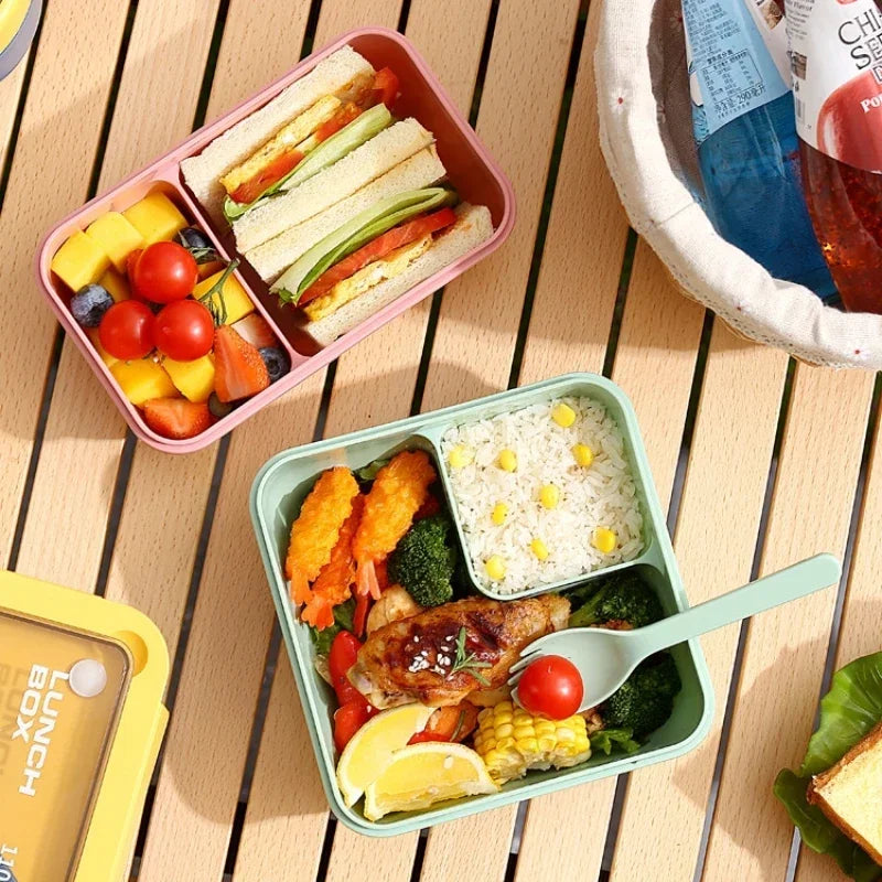 Pudełko na lunch BentoGo z szczelnym zamknięciem, wbudowanymi sztućcami, nadające się do mikrofalówki i zmywarki.