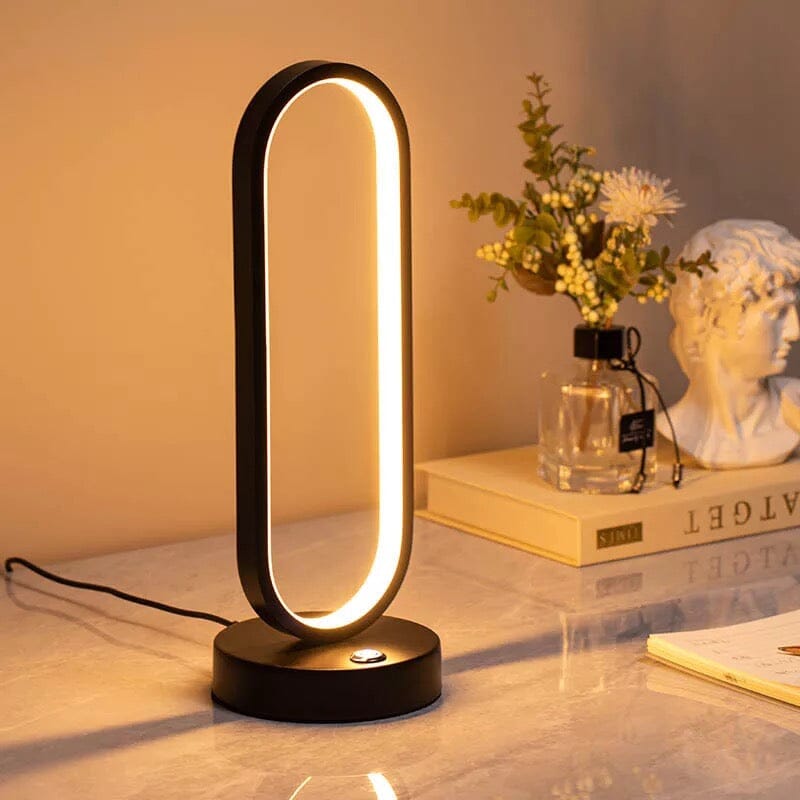 Luminova kompaktní oválná lampa s železným povrchem pro moderní pokoje