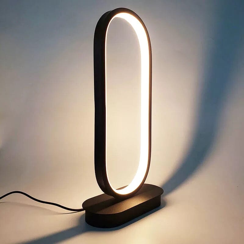 Luminova kompaktní oválná lampa s železným povrchem pro moderní pokoje