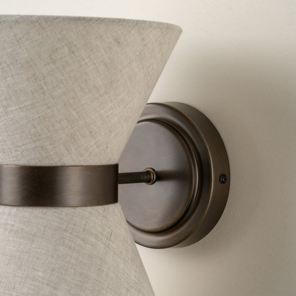 Bronze & Linen Wall Light Delivers Warm, Tranquil Illumination